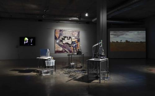 Wall L-R: Daniel Mudie Cunningham 'True Colours', Mumu Mike Williams and Sammy Dodd 'Postbag Painting', Alana Hunt 'En Masse' Mid: Uri Auerbach 'The Western Lands'